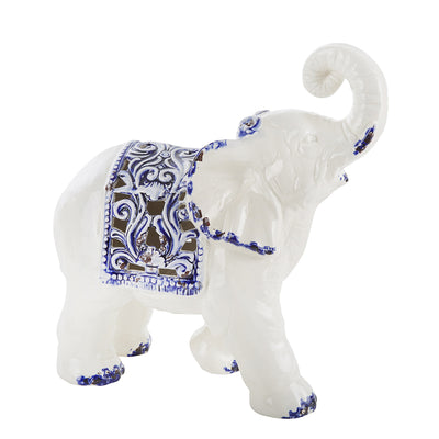 escultura elefante blanco con azul lateral
