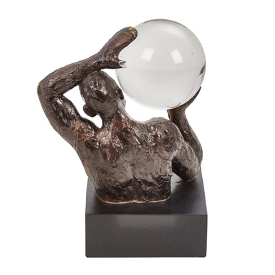 escultura de hombre con esfera