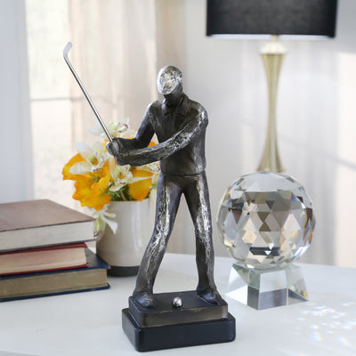 escultura de golfista