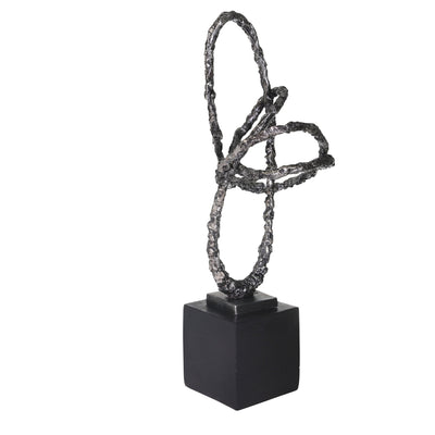 escultura abstracta plata lateral