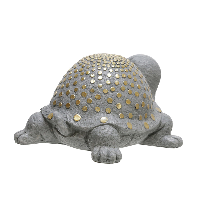 escultura de tortuga gris dorada