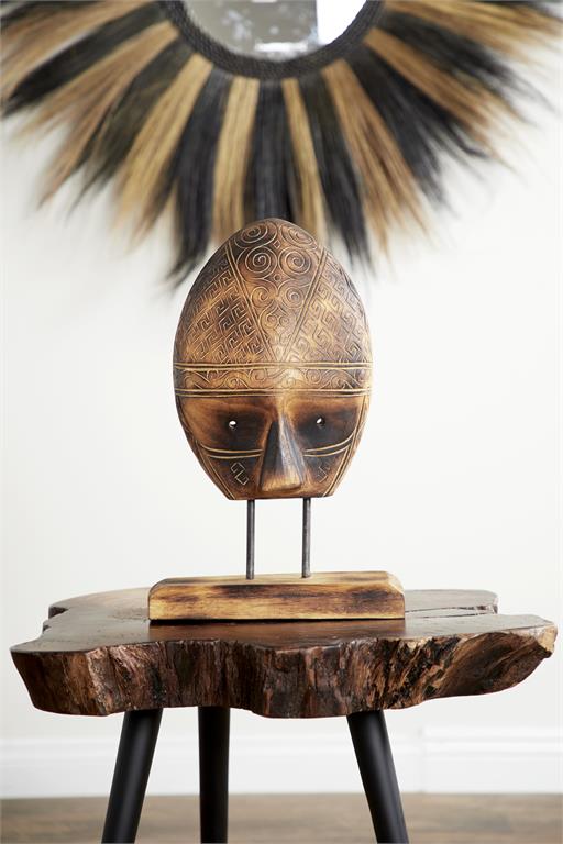 escultura de mascara tribal