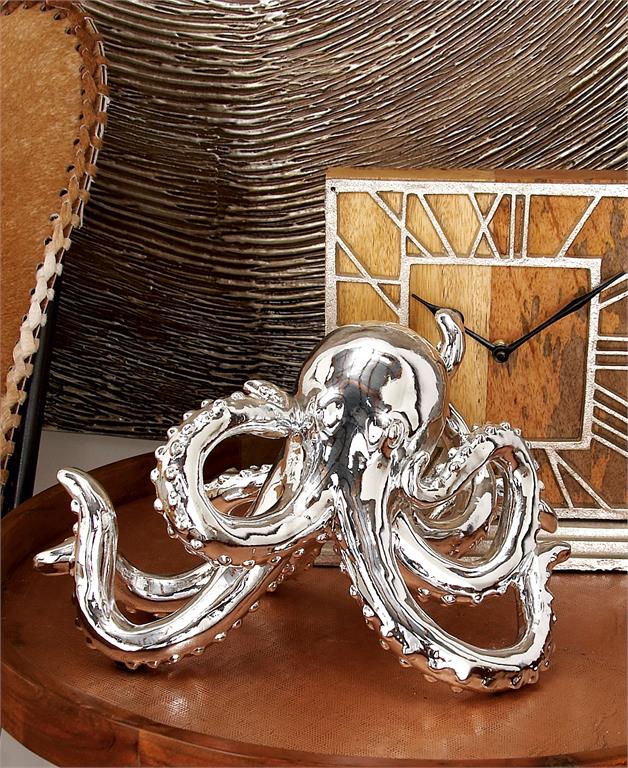 escultura de pulpo plata